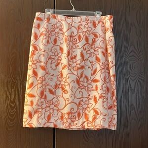 Judith Hart white skirt with orange floral design. Size 16. NWT